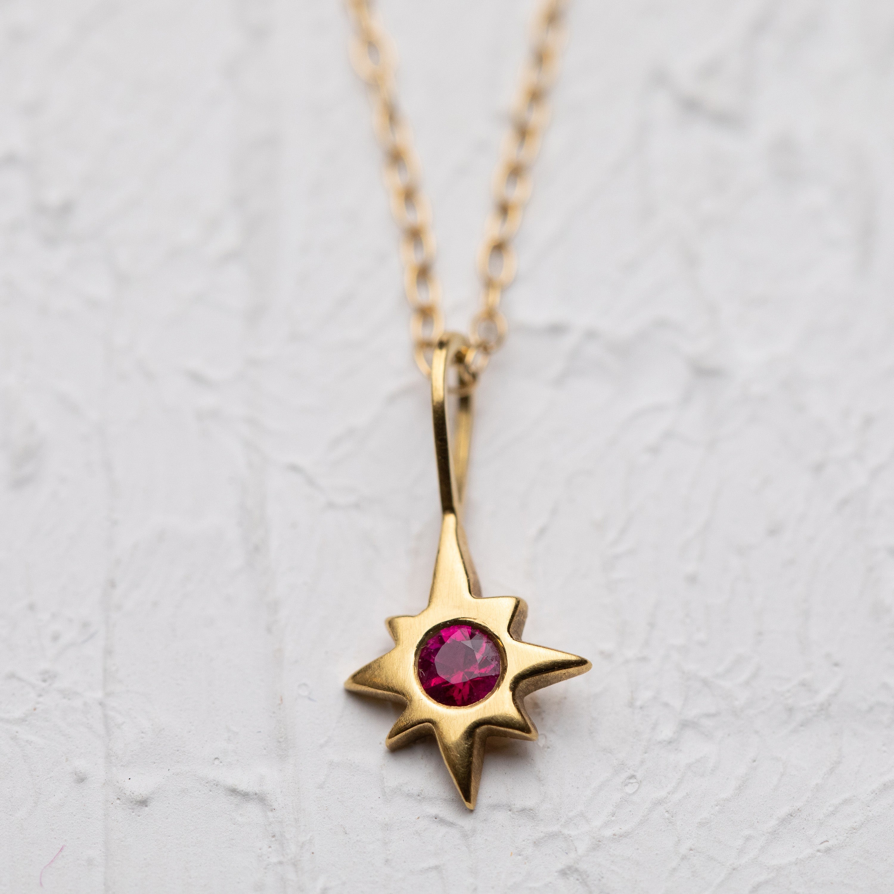 Ruby on a 8 Pointed Star Necklace (18k)