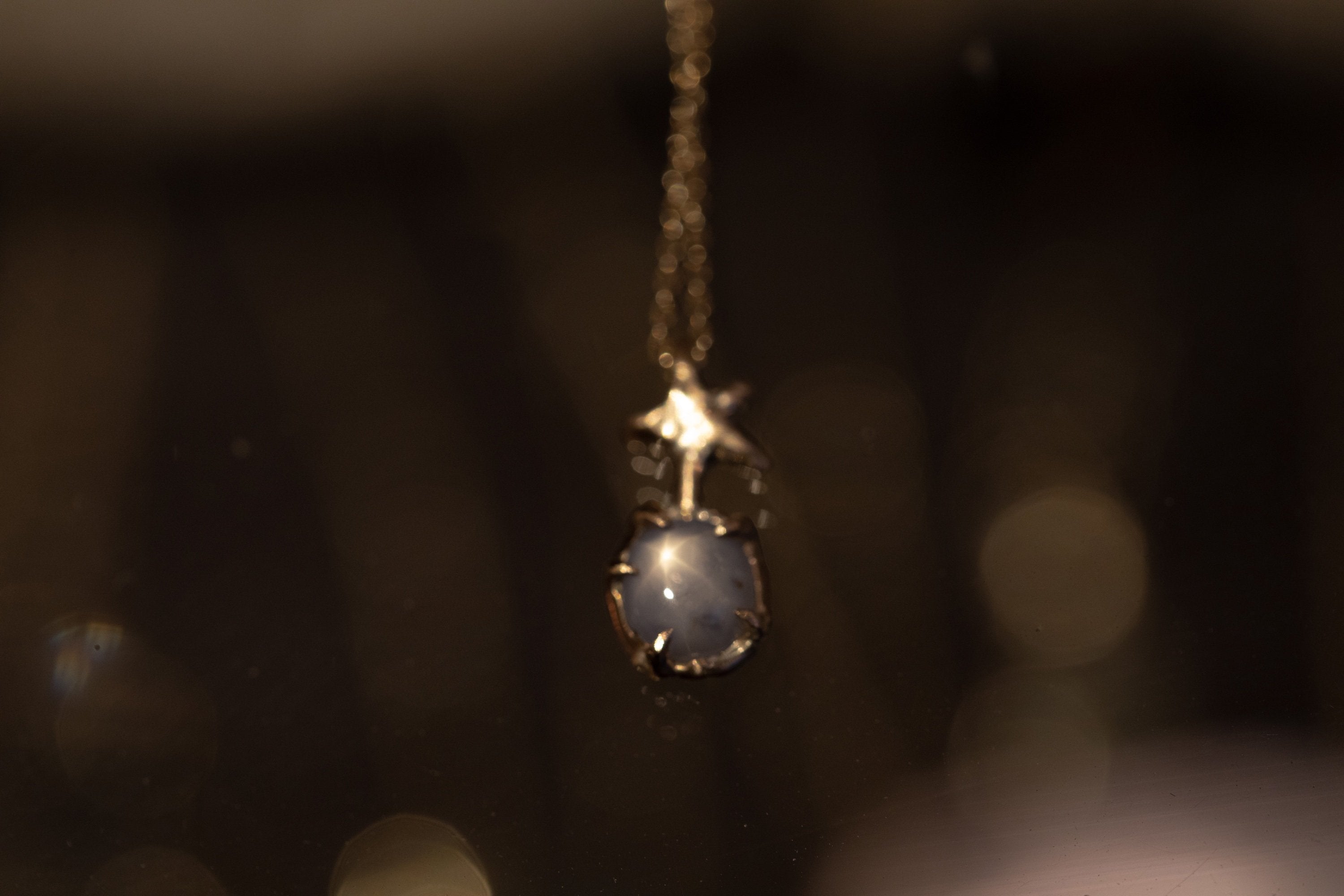Dancing Star with a Blue Star Sapphire (10k)