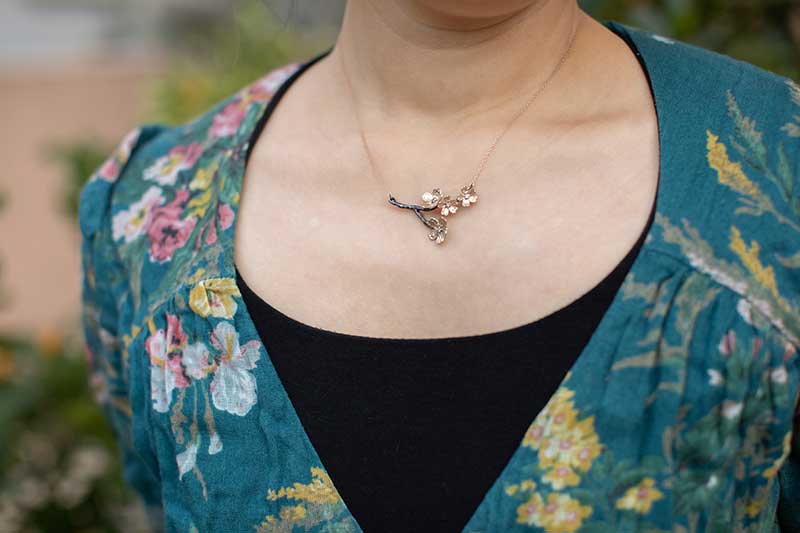 Small and Large Sakura Blossoms on a Branch with Rose gold Chain