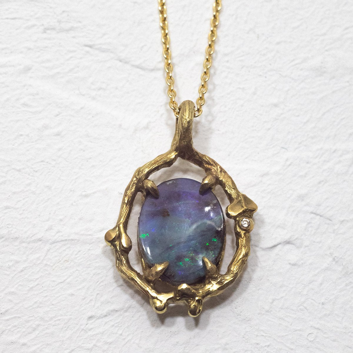 Boulder Opal Surrounded by Thyme (18k)