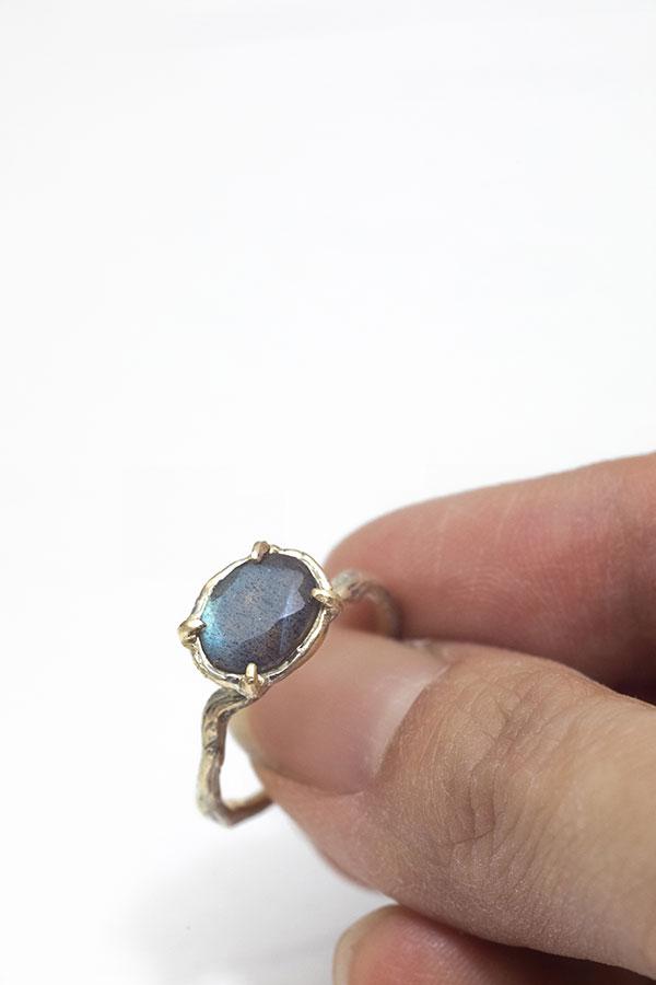 Small Labradorite Held by Tiny Branch Ring
