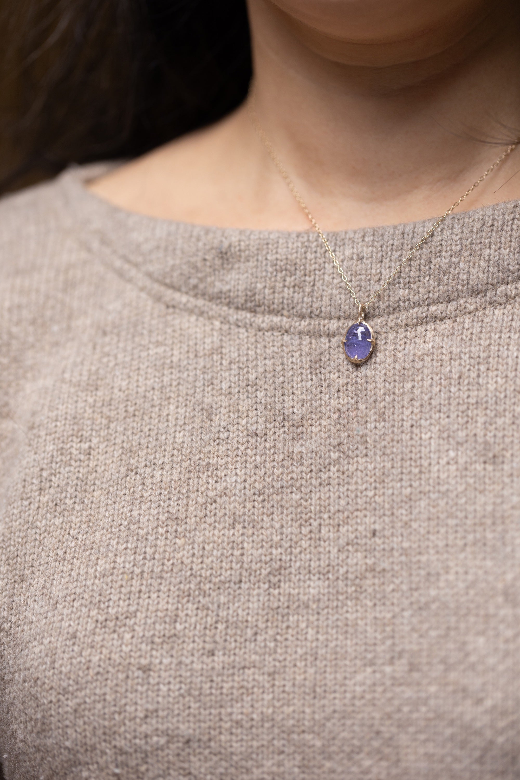 Held in Four Point Tanzanite Necklace (10k)