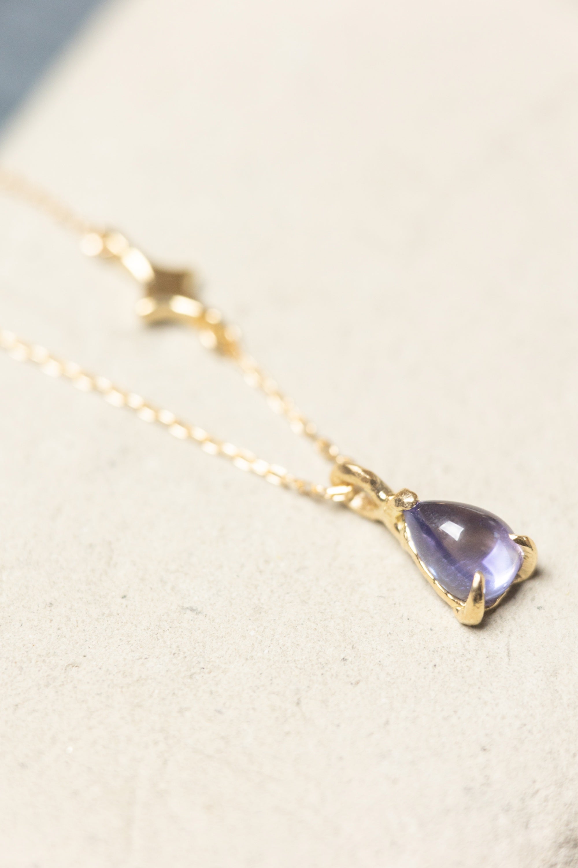 Tiny Tanzanite Necklace with a Stardust (18k)
