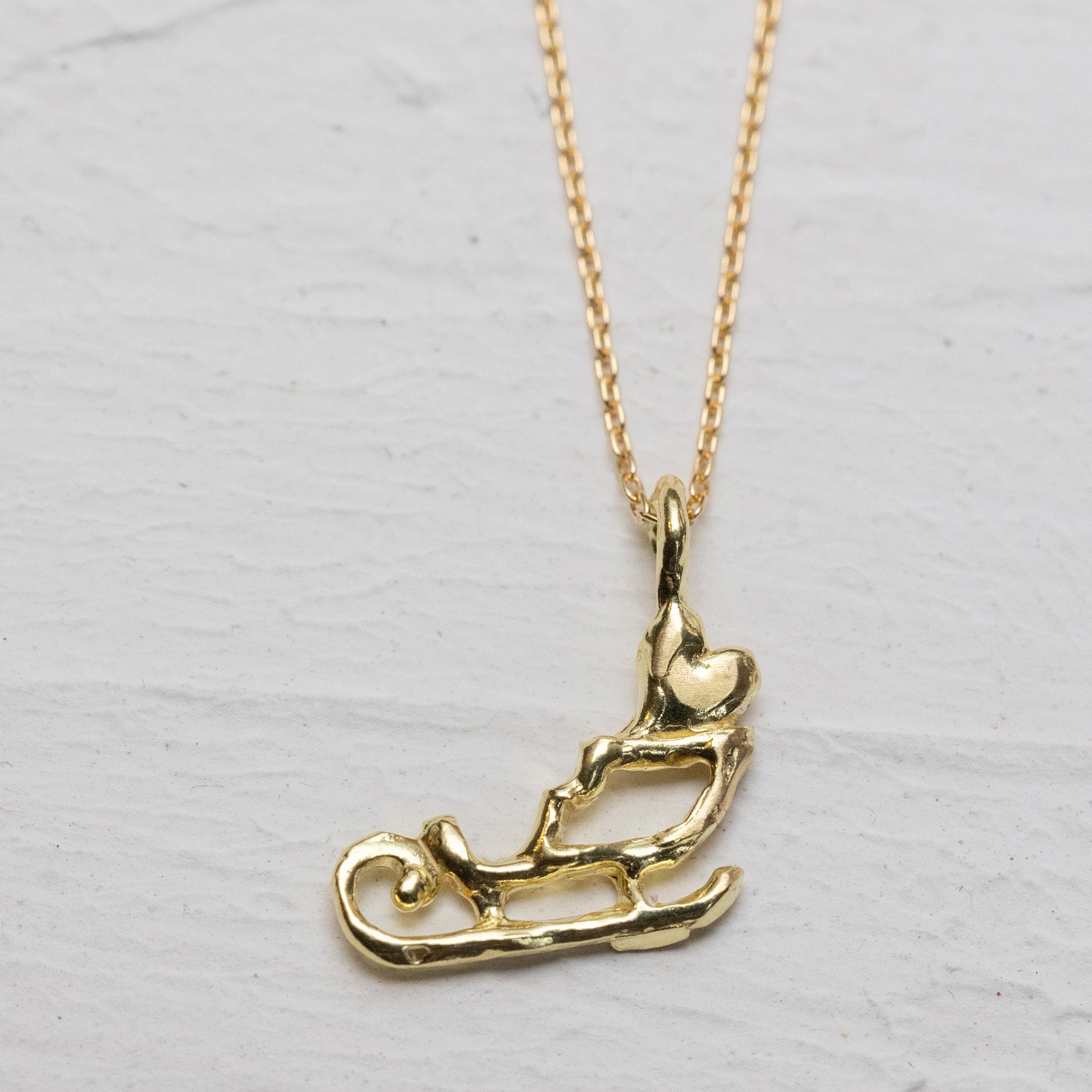 Delivering a Big Heart on a Sleigh 18k Gold Necklace