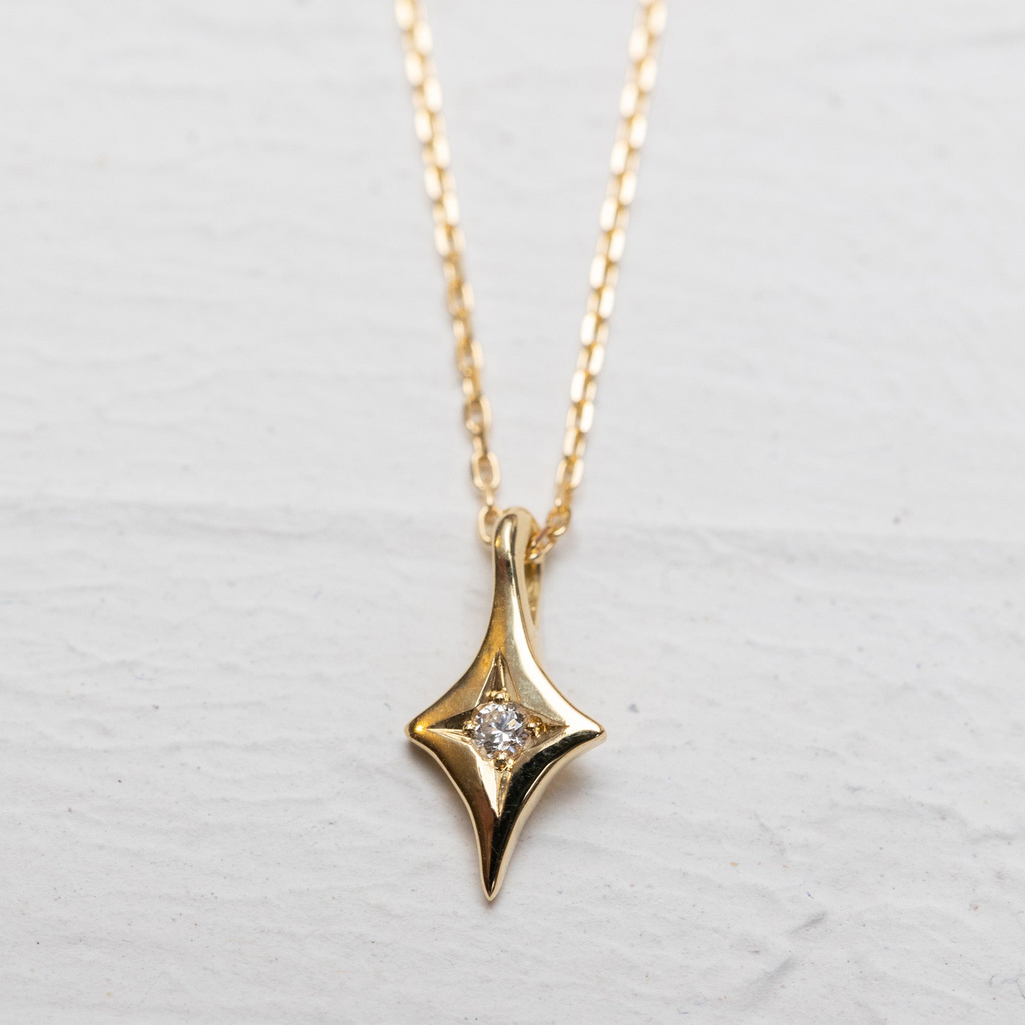 Four Pointed Star Necklace in Gold