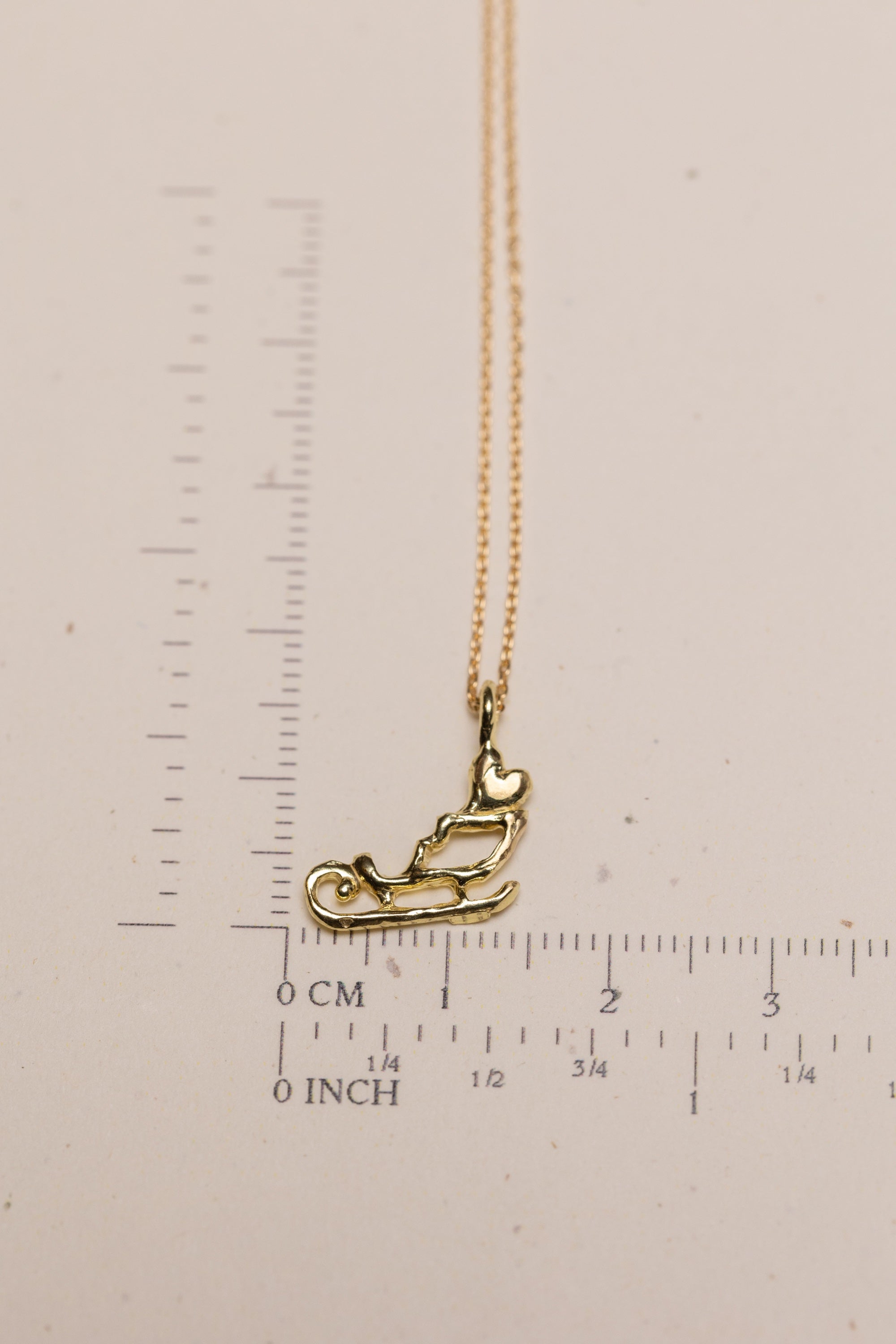 Delivering a Big Heart on a Sleigh 18k Gold Necklace