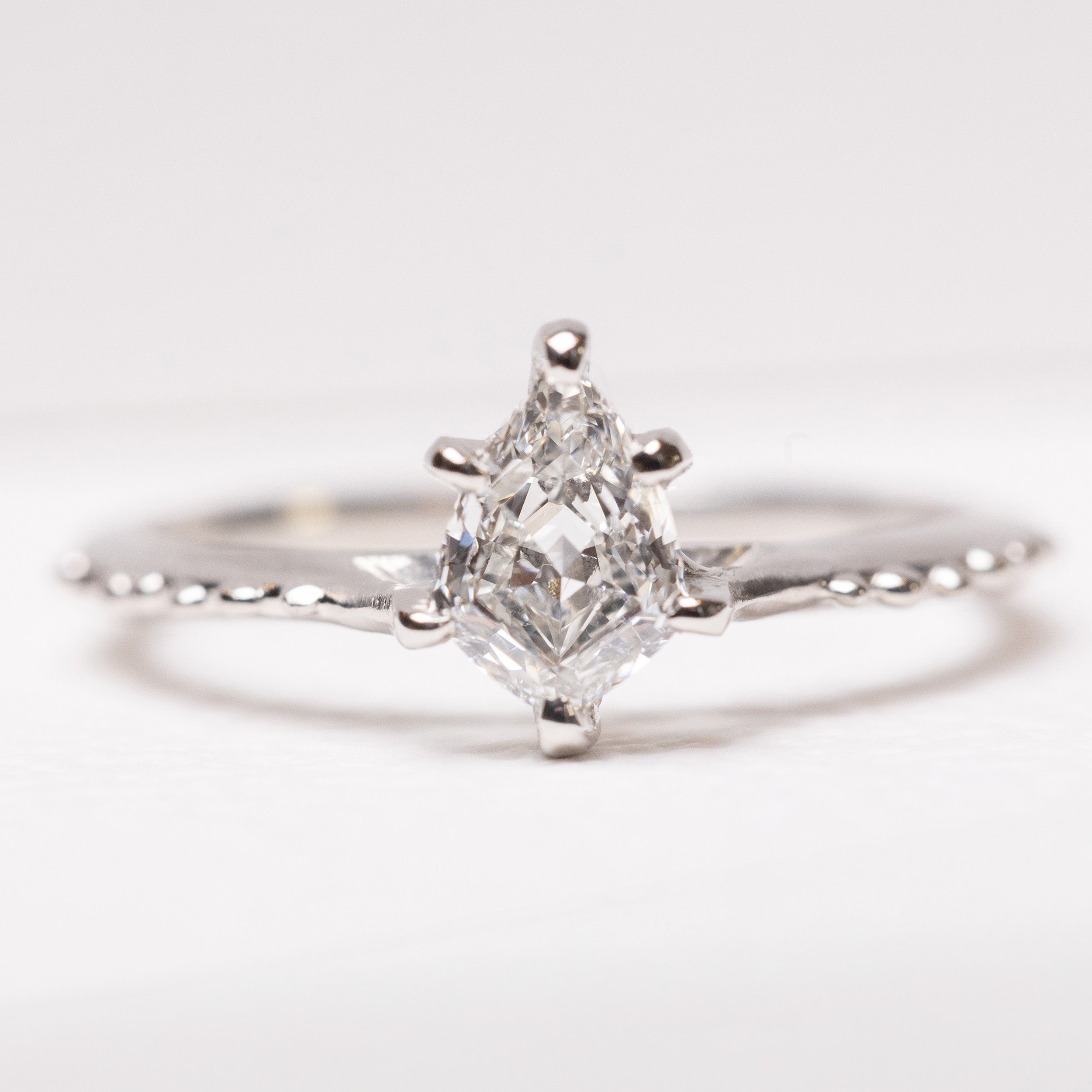 Geometric Pear Shape Diamond Ring in Platinum